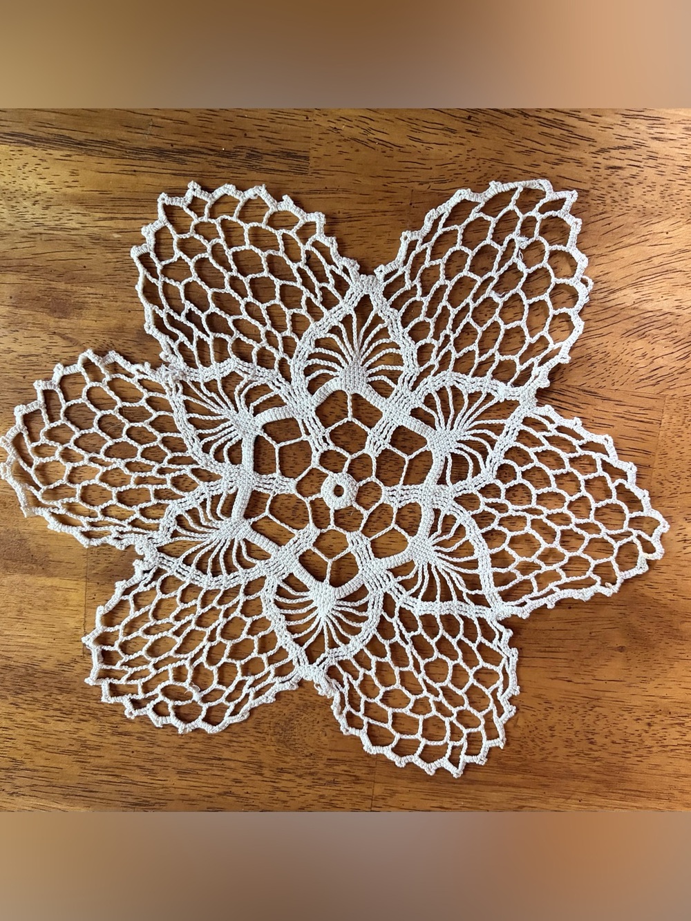 Elegant handmade,cream crochet lace dolly.6 pointed star/sunflowers.11 inches
